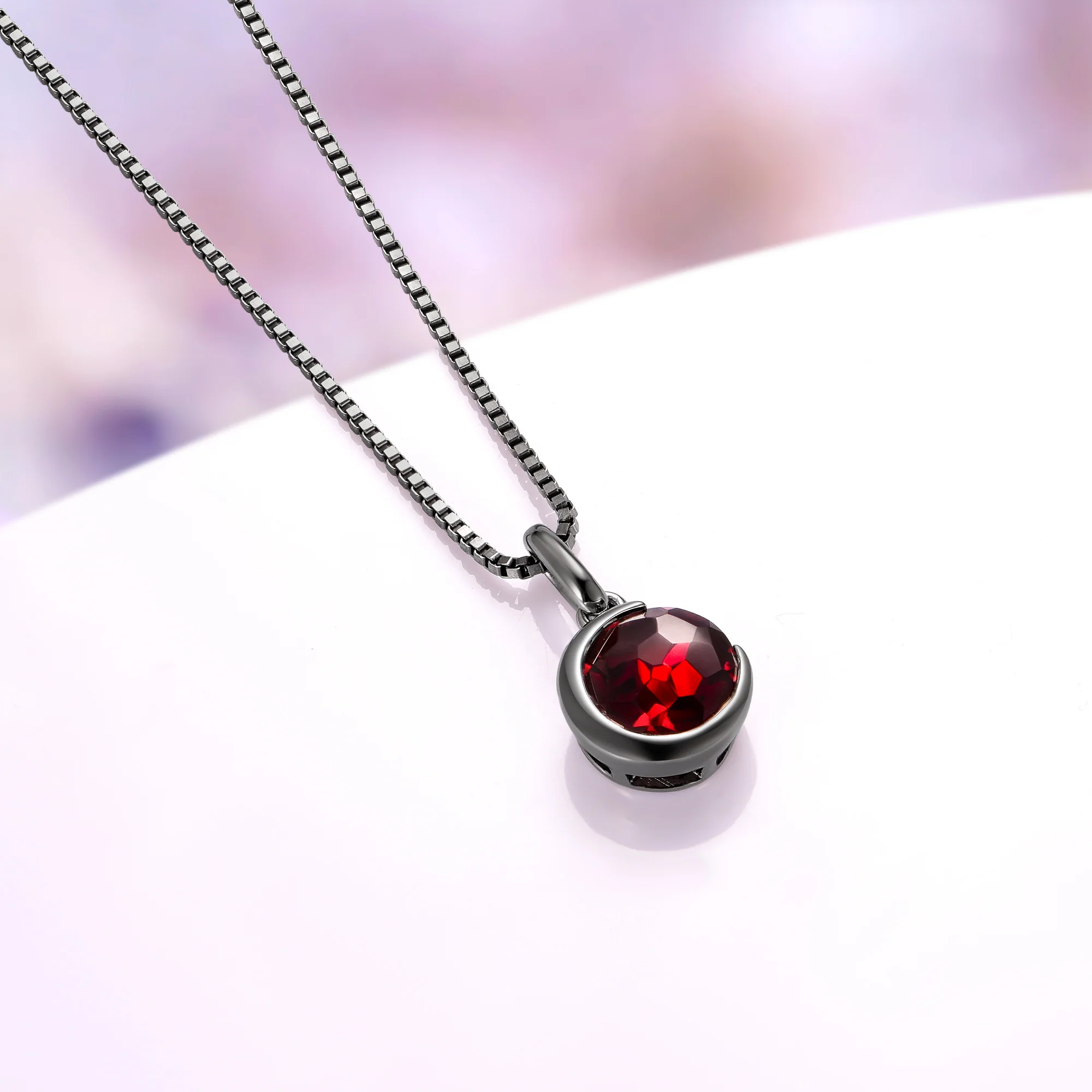 Crescent Moon Garnet Necklace in Black Ruthenium - Image 3